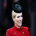 Britain's Zara Phillips smiles in the unsaddling enclosure on Ladies Day at the Cheltenham Festival horse racing meet in Gloucestershire